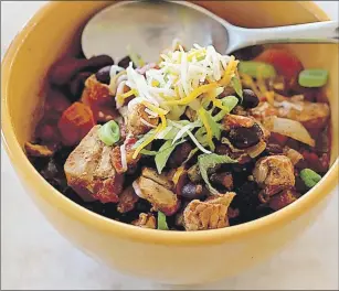  ??  ?? Slow cooker chicken chili is from a recipe by Katie Workman.
AP PHOTO