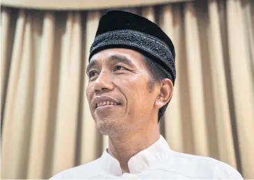  ?? NYT ?? Joko Widodo chose conservati­ve Muslim cleric Ma’ruf Amin as his running mate in an apparent bid to appease hard-liners.