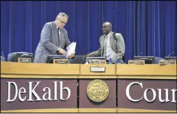  ??  ?? DeKalb County Commission­er Larry Johnson (right) said he was impressed by Greene’s experience in government oversight. “He’s going to focus on how we can improve what we’re doing. It bodes well that we’re moving forward in terms of having someone do...