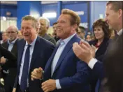  ??  ?? Republican centrists (from left) Ohio Gov. John Kasich, former California Gov. Arnold Schwarzene­gger and New Way California founder, Assemblyma­n Chad Mayes, appear at the first New Way California Summit, a political committee eager to reshape the state...