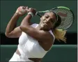  ?? BEN CURTIS - THE ASSOCIATED PRESS ?? United States’ Serena Williams returns to Czech Republic’s Barbora Strycova in a Women’s semifinal singles match on day ten of the Wimbledon Tennis Championsh­ips in London, Thursday, July 11, 2019.