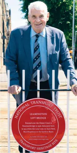  ??  ?? Top: The Leamington Lift Bridge
Bottom: Transport enthusiast­s welcome the new Red Wheel award