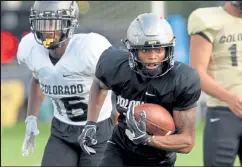  ?? Cliff Grassmick ?? University of Colorado Boulder football player La’vontae Shenault, pictured in August 2019, was ticketed for speeding and driving with a revoked license in Boulder County this month, the third traffic case the Buffs’ wide receiver has picked up less than a year.
Staff Photograph­er