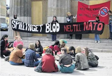  ?? PHOTO: REUTERS ?? No to Nato . . . Protesters against Swedish membership in Nato gather outside the Swedish Parliament in Stockholm last week.