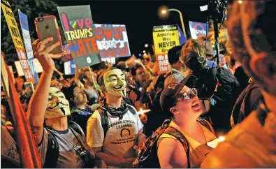  ?? DOMINICK REUTER / REUTERS ?? Protesters gather on the third day of the Democratic National Convention in Philadelph­ia on Wednesday.