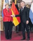 ?? FOTO: REUTERS ?? Angela Merkel und Argentinie­ns Präsident Maurico Macri.