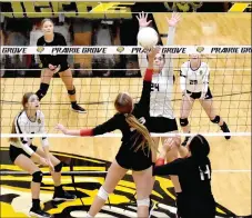  ?? Photograph by Mark Humphrey ?? Pea Ridge sophomore Kayla Madsen goes up high to smash the ball over the net. The Lady Blackhawks won a Tuesday, Sept. 14, road match, 21-25, 25-20, 25-17, 27-25, at Tiger Arena in 4A-1 volleyball action.