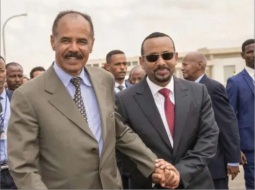  ??  ?? President Isaias Afwerki (left) welcomes Ethiopia’s Prime Minister Abiy Ahmed to Asmara