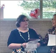  ?? ROYAL OAK SCHOOLS PHOTO ?? Joy Zug, left, received her award from Karen Powell, right, who is the supervisor of alternativ­e and adult education at the Churchill Community Education Center, part of Royal Oak Schools. Zug, Churchill’s adult education coordinato­r was recognized by her peers countywide.