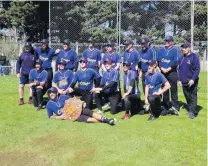  ?? PHOTO: SUPPLIED ?? Happy ballers . . . The victorious Otago men’s softball team of (back row from left) Lyall Scott (assistant coach), Ryan Silke, Corey Senelale, Calab Leddie, Kenji Suzuki, Doug Hill, Al Conway, Arana Kelly and Mark Ahlfeld (coach) and (front row from left) Aaron Parai, James Mathison, Jake Burtenshaw (captain), Logan Herbert, Ben Foster, Patrick Oxley and Nelson Yortson (lying down with the Bates Shield).