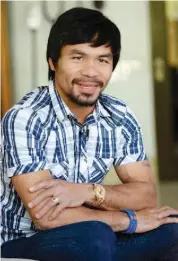  ??  ?? Philippine boxing legend Manny Pacquiao gestures during an interview at his residence in Manila on April 28, 2016. Pacquiao expressed shock on April 28 at President Benigno Aquino’s claim that Islamic militants planned to kidnap him, and said the...