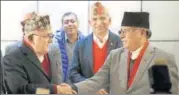  ?? REUTERS FILE ?? ▪ Chairman of Communist Party of Nepal (UML) KP Oli (left) greets Communist Party of Nepal (Maoist Centre) chairman Prachanda. The alliance has a very strong Chinese backing.