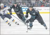  ?? NHAT V. MEYER — BAY AREA NEWS GROUP ?? The Sharks’ William Eklund (72) controls the puck against the Blues in the first period at SAP Center on Thursday in San Jose.