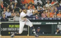  ?? DAVID J. PHILLIP/ASSOCIATED PRESS ?? The Astros’ Carlos Correa strikes out swinging against the Rays during Tuesday’s game in Houston. The Rays snapped Houston’s 12-game winning streak.