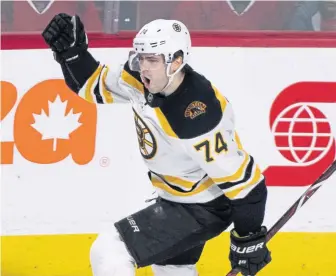  ?? ASSOCIATED PRESS ?? ON A ROLL: Jake DeBrusk celebrates after scoring against the Canadiens Saturday night.