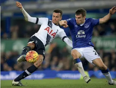  ??  ?? Above Alli’s superb strike earned Spurs a point at Everton Below “Hey, Hugo, remember the time I scored past you...?”