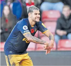  ?? REUTERS ?? Newcastle’s Bruno Guimaraes reacts after scoring a goal.