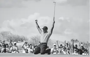  ??  ?? Tiger Woods celebrates after making an eagle putt on the seventh hole during the final round Sunday of the Hero World Challenge. KYLE TERADA/USA TODAY SPORTS