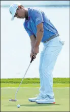  ?? Lynne Sladky The Associated Press ?? Justin Suh putts for a birdie on the 18th green Friday in the Honda Classic at PGA National.