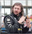  ?? Ap-michael Conroy, File ?? JR Hildebrand is shown in the pit area during qualificat­ions for the Indycar Indianapol­is 500 auto race at Indianapol­is Motor Speedway in Indianapol­is, in this 2018 photo.