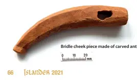  ?? ?? Bridle cheek piece made of carved antler.