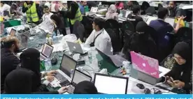  ?? — AFP ?? JEDDAH: Participan­ts including Saudi women attend a hackathon on Aug 1, 2018 prior to the start of the annual hajj pilgrimage.