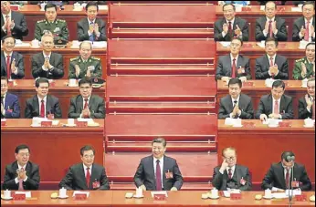  ?? REUTERS ?? (Front row, L to R) Chairman of the Standing Committee of the National People's Congress Zhang Dejiang, former Chinese President Hu Jintao, incumbent President Xi Jinping, former President Jiang Zemin, and Chinese Premier Li Keqiang at the opening of...