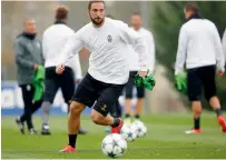 ?? AFP ?? Juventus’ forward Gonzalo Higuain from Argentina takes part in a training session on the eve of a Champions League match. —