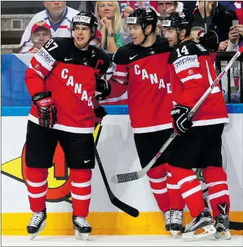  ?? — GETTY IMAGES ?? Captain Sidney Crosby, Taylor Hall and Jordan Eberle celebrate a goal against the Czech Republic in Saturday’s semifinal at the world championsh­ip.