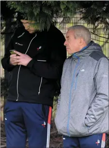  ?? Picture: Ken Finegan ?? Pete McGrath takes shelter during the Dundalk Gaels v St Mary’s match at The Ramparts on Sunday.