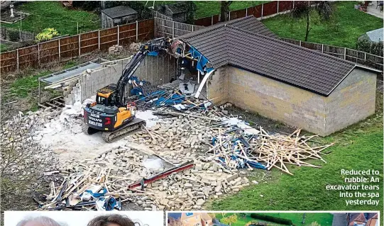  ?? ?? Reduced to rubble: An excavator tears into the spa yesterday