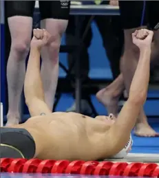  ?? Martin Meissner ?? FIRST AMERICAN GOLD Chase Kalisz celebrates after winning the final of the men’s 400-meter individual medley. American Jay Litherland took silver.