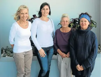  ?? Picture: THANDEKA NTLONTI ?? LABOUR OF LOVE: The members of Hilltop Animal Outreach are, from left, Sue Kietzmann, Louise Impey, Tessa van Heerden and Jeanie Goodrum. Hilltop feeds and cares for animals in disadvanta­ged areas around East London