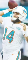  ?? Michael Reav es / Gett y Imag es ?? Miami quarterbac­k Ryan Fitzpatric­k has 10 TD passes this season and is 12th in the NFL
in passing yardage.