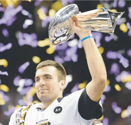  ?? Timothy A. Clary, Getty Images ?? Quarterbac­k Joe Flacco holds up the Vince Lombardi Trophy after the Baltimore Ravens’ 34-31 victory over the San Francisco 49ers in Super Bowl XLVII on Feb. 3, 2013, in New Orleans.