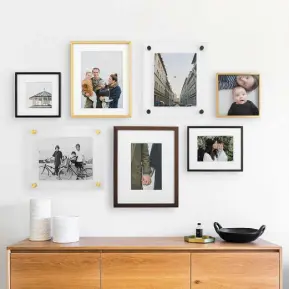  ??  ?? MAKE IT SNAPPY: Picture ledges, like Mosslanda from Ikea, €6.50, left, can showcase an eclectic gallery wall. Above, mix up frame and mount styles for a fun finish, from €63; artifactup­rising.com