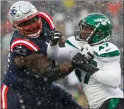  ?? ASSOCIATED PRESS FILE PHOTO ?? New England Patriots guard Mike Onwenu (71) battles with New York Jets linebacker Bryce Huff (47) during the first half of a game earlier this year in Foxborough, Mass.