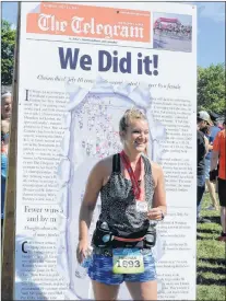  ??  ?? Meghan Fillier poses for a souvenir photo after completing the Tely 10 in a time of 1: 39:49.