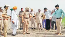  ?? HT PHOTO ?? Police at the spot where the girl was attacked by stray dogs in Sangrur on Thursday.