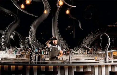  ??  ?? InterConti­nental Phu Quoc Long Beach Resort’s INK 360 is a squid-inspired rooftop bar.