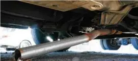  ?? MATT ROURKE/ASSOCIATED PRESS ?? The exhaust pipe of a car missing its catalytic converter. In Newton, 11 such thefts occurred from Sept. 24 to Oct. 25.