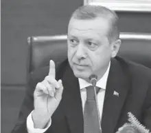  ??  ?? Turkish Prime Minister Tayyip Erdogan speaks to the media in his office in Ankara, Turkey yesterday.
