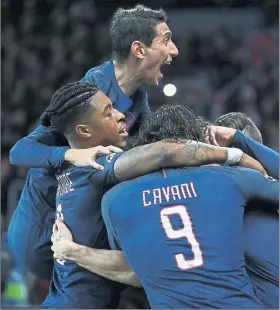  ?? Picture: Getty ?? GROUP HUG: Angel di Maria and Co celebrate a famous victory.