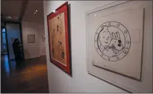  ?? MICHEL EULER — THE ASSOCIATED PRESS ?? The Chinese inked on paper original of the comic character Tintin and his dog snowy as a pirate made for an advertisin­g and drawn by Belgian creator Herge, is displayed at the Artcurial auction house in Paris, Wednesday.