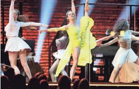  ?? FILE//INVISION/AP ?? Misty Copeland, center, performed at the 62nd annual Grammy Awards in Los Angeles. Thirty-two dancers from 14 countries have performed a ballet for a virtual audience to benefit the struggling dance community.