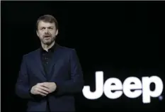  ??  ?? In this file photo dated Jan. 16, Mike Manley, head of Jeep Brand, introduces the 2019 Jeep Cherokee during the North American Internatio­nal Auto Show, in Detroit, USA. AP PHOTO/CARLOS OSORIO