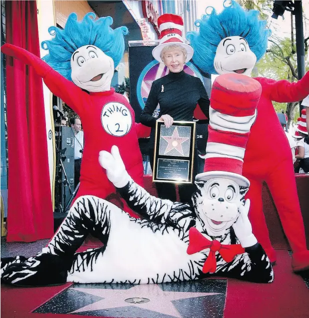  ?? REED SAXON / THE ASSOCIATED PRESS ?? Audrey Geisel, widow of famed children’s book author Theodor Seuss Geisel, better known as Dr. Seuss, with Dr. Seuss characters in 2004.