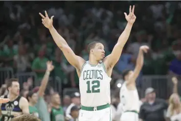  ?? AGENCE FRANCE PRESSE ?? Grant Williams #12 of the Boston Celtics reacts during the fourth quarter in Game Seven of the 2022 NBA Playoffs Eastern Conference Semifinals against the Milwaukee Bucks at TD Garden in Boston, Massachuse­tts.