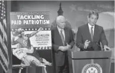  ?? MANUEL BALCE CENETA/THE ASSOCIATED PRESS ?? U.S. Senators John McCain, left, and Jeff Flake talk to reporters about ’patriotism for profit’ practices at pro sporting events, including the NFL.