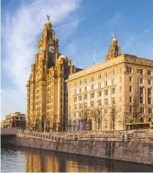  ??  ?? Boatmen would tell the time by the Royal Liver Building clock towers in Liverpool